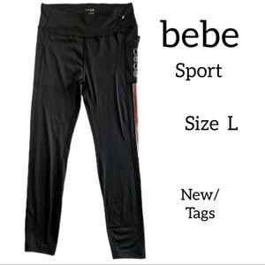 BEBE SPORT BLACK LEGGINGS SIZE L SIDE STRIPES SIDE POCKETS NEW WITH TAGS